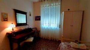 Postel nebo postele na pokoji v ubytování B&B Rosa