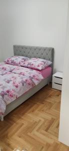 Ένα ή περισσότερα κρεβάτια σε δωμάτιο στο Leo Apartment