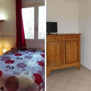 een slaapkamer met een bed en een dressoir met een televisie bij appartement du pecheur in Valras-Plage