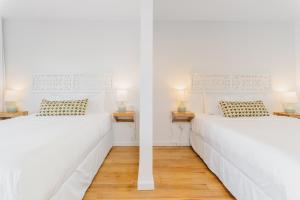 Katil atau katil-katil dalam bilik di The Beach House Boutique Hotel