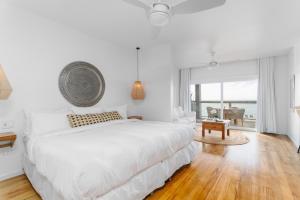 Katil atau katil-katil dalam bilik di The Beach House Boutique Hotel