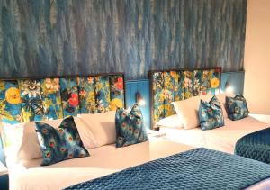Voodi või voodid majutusasutuse Allingham Arms Hotel toas
