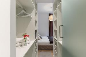Ein Bett oder Betten in einem Zimmer der Unterkunft Waou Chamberi V - Alquiler Corta Duración