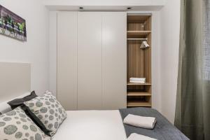 Ein Bett oder Betten in einem Zimmer der Unterkunft Waou Chamberi V - Alquiler Corta Duración