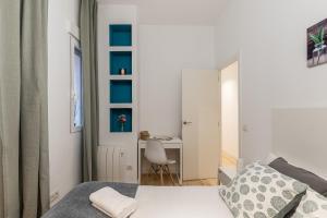 Ein Bett oder Betten in einem Zimmer der Unterkunft Waou Chamberi V - Alquiler Corta Duración