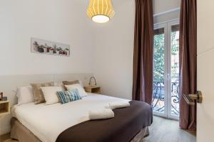 Ein Bett oder Betten in einem Zimmer der Unterkunft Waou Chamberi V - Alquiler Corta Duración