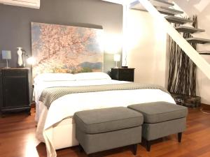 Postel nebo postele na pokoji v ubytování Fantastic Penthouse Malaga Center