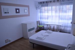 Posteľ alebo postele v izbe v ubytovaní ArArAt Hostel