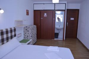 Posteľ alebo postele v izbe v ubytovaní ArArAt Hostel