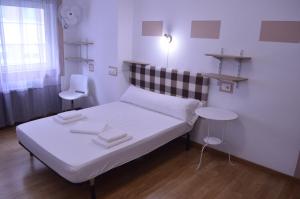 Posteľ alebo postele v izbe v ubytovaní ArArAt Hostel