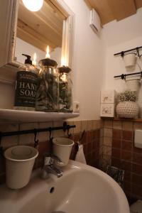 Koupelna v ubytování Linne-Cottage