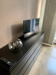 En tv och/eller ett underhållningssystem på Apartmán Luhačovice
