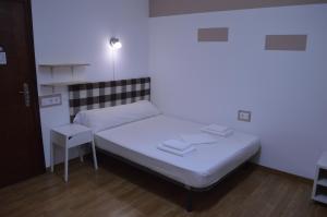 Posteľ alebo postele v izbe v ubytovaní ArArAt Hostel