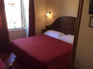 Postel nebo postele na pokoji v ubytování Hotel Al SanPietrino