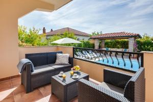 Balkón nebo terasa v ubytování JURIĆ Apartments-Rab