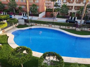 The swimming pool at or close to Apartamento exótico en primera línea de Vera-Playa!