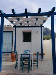Patio nebo venkovní prostory v ubytování B&B Santorini