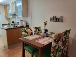 A kitchen or kitchenette at Apartamento exótico en primera línea de Vera-Playa!