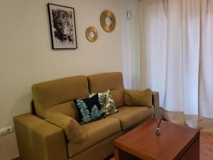 A seating area at Apartamento exótico en primera línea de Vera-Playa!