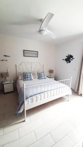 Łóżko lub łóżka w pokoju w obiekcie El Gueco Holiday Apartment