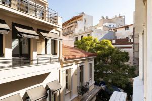 a view from the balcony of a building at Na'maste Apartments in Athens