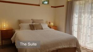 Ένα ή περισσότερα κρεβάτια σε δωμάτιο στο Bluff Hill Bed & Breakfast +12 φωτογραφίες