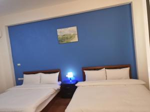 Postel nebo postele na pokoji v ubytování Gentlemen B&B