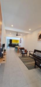 Et opholdsområde på Guesthouse @ Ipoh garden II