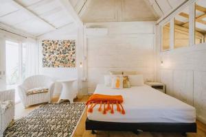 Tempat tidur dalam kamar di Chanteak Bali