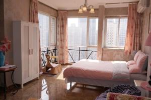 Xiao Yu Residential Apartment Near Jiefangbei and Hongya Cave客房内的一张或多张床位