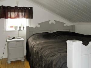 Ένα ή περισσότερα κρεβάτια σε δωμάτιο στο 4 person holiday home in RÄTTVIK-By Traum