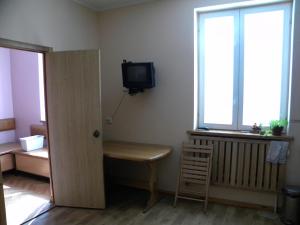 Postel nebo postele na pokoji v ubytování Guest House Dacha