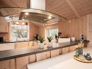 a kitchen with a large counter top in a room at 6 person holiday home in Vinderup in Vinderup