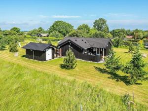 an aerial view of a house on a field at Three-Bedroom Holiday home in Nordborg 5 in Nordborg