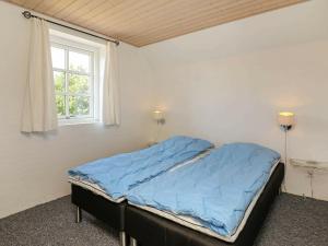 Postel nebo postele na pokoji v ubytování 18 person holiday home in Ulfborg-By Traum + 37 fotografií