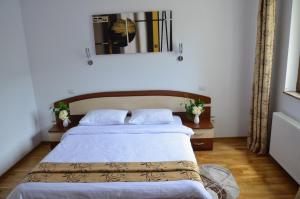 Postel nebo postele na pokoji v ubytování Casa Tibi - Sinaia