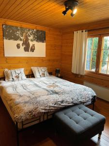 Кровать или кровати в номере Chalet Du Val 53