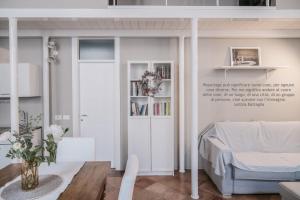 A bed or beds in a room at Le Gelosie B&B