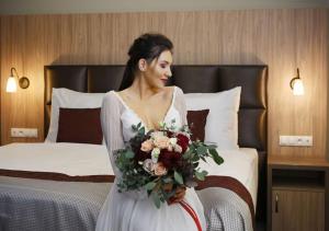 Voodi või voodid majutusasutuse EFI SPA Hotel Superior & Pivovar toas