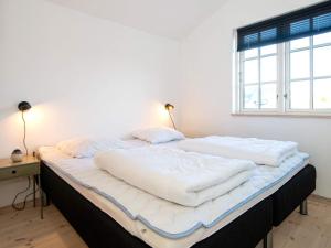 Postel nebo postele na pokoji v ubytování Holiday Home Anker II