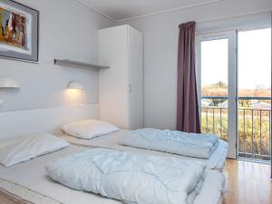 Postel nebo postele na pokoji v ubytování Beautiful Holiday Home in HÃ¸jer with Terrace