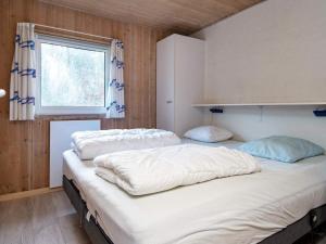 Postel nebo postele na pokoji v ubytování 10 person holiday home in Glesborg-By Traum + 23 fotografií