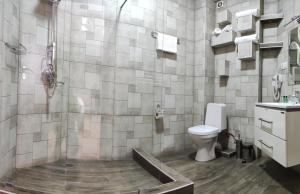 Vannituba majutusasutuses Legend Hotel