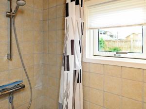 Koupelna v ubytování 6 person holiday home in Brenderup Fyn-By Traum