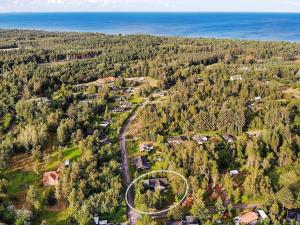 an aerial view of a house in a forest at 8 person holiday home in Gedser in Gedser