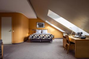 Voodi või voodid majutusasutuse Hotel Soho toas