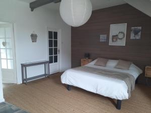 Кровать или кровати в номере Le clos des sources