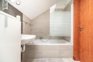 Koupelna v ubytování Grand 56 Apartman-Keszthely