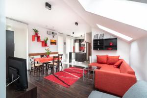 Posezení v ubytování Grand 56 Apartman-Keszthely