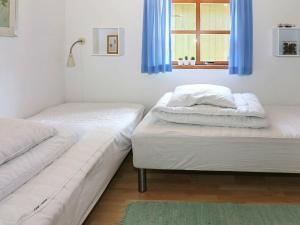 Una cama o camas en una habitación de Holiday home Hadsund XLVI